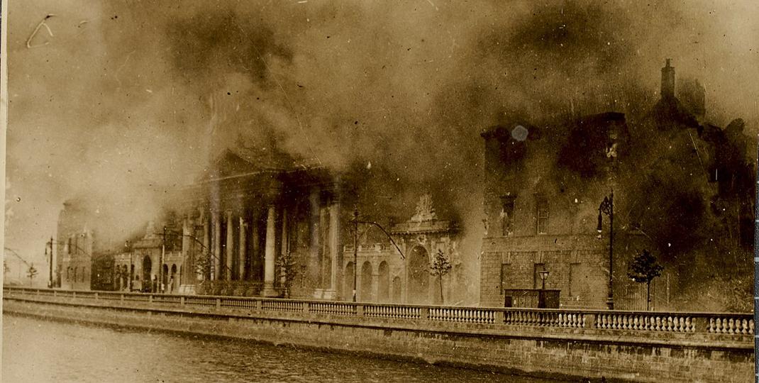 historical photo of a building on fire